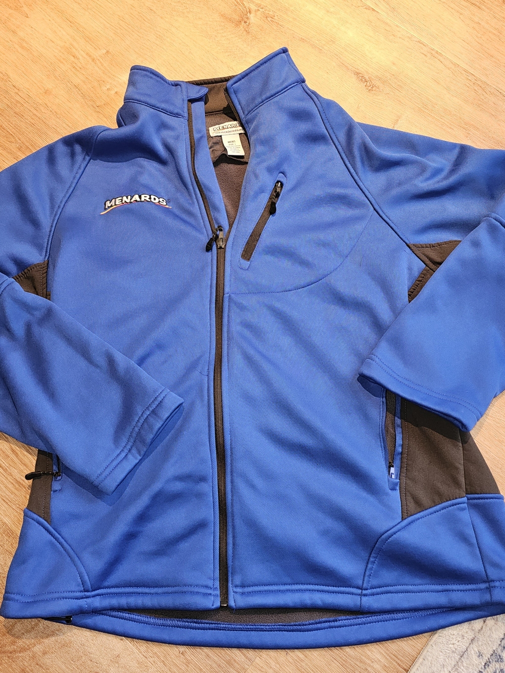 official Menards store employee uniform softshell jacket in a men's size Large